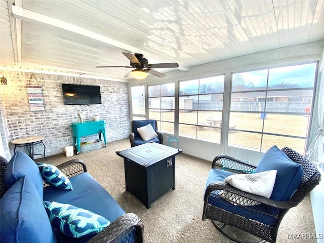 sunroom / solarium with ceiling fan