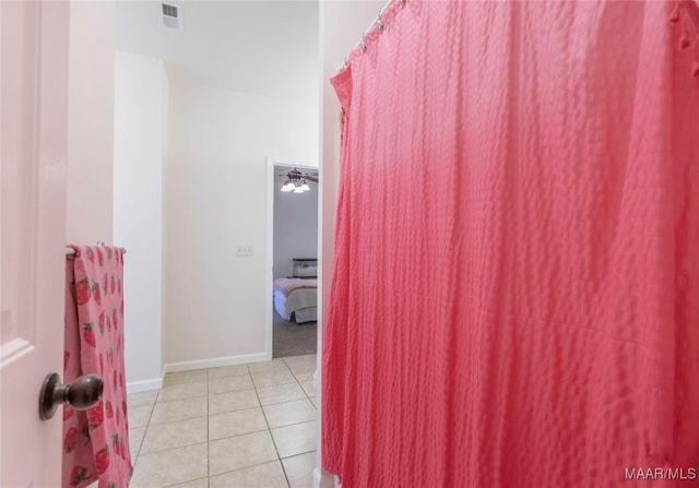 bathroom with tile patterned flooring