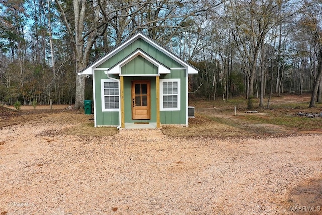 view of outdoor structure featuring central air condition unit