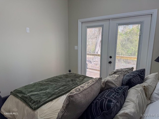 bedroom featuring french doors and access to exterior