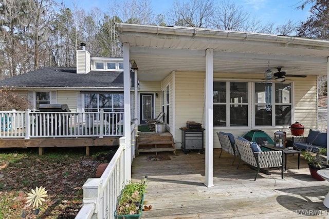 wooden deck with ceiling fan