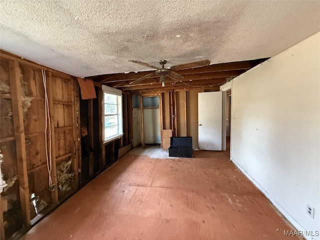 interior space featuring a textured ceiling