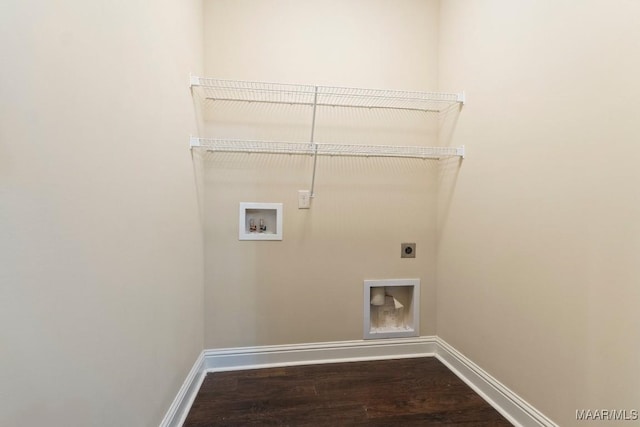 laundry area featuring laundry area, electric dryer hookup, wood finished floors, washer hookup, and baseboards