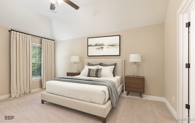 carpeted bedroom featuring ceiling fan, visible vents, baseboards, and lofted ceiling