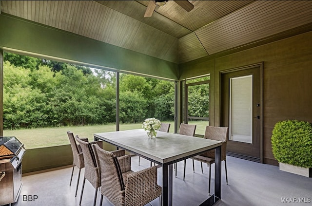 sunroom with wood ceiling and vaulted ceiling