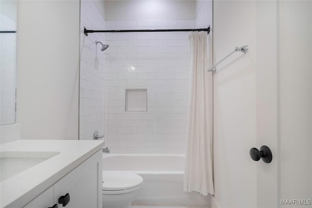 full bathroom with vanity, toilet, and shower / bath combo with shower curtain