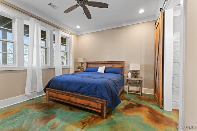 bedroom featuring ornamental molding, a barn door, and ceiling fan