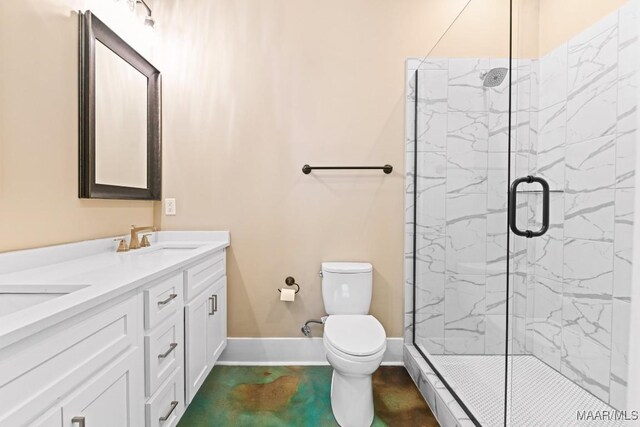 bathroom featuring vanity, toilet, and a shower with door