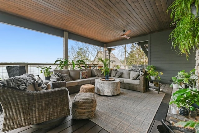 view of patio / terrace with ceiling fan and an outdoor hangout area