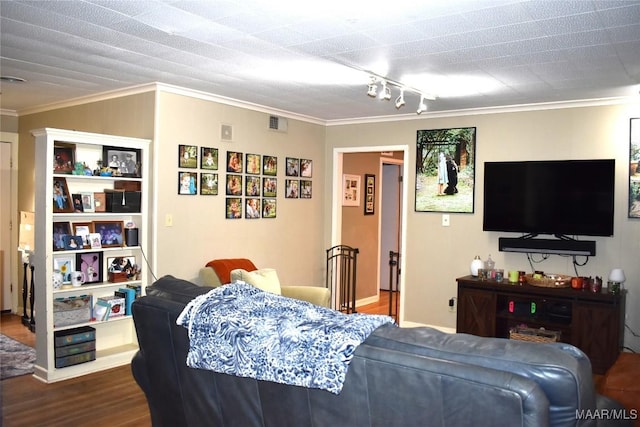 bedroom with hardwood / wood-style flooring and ornamental molding