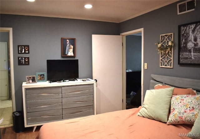 bedroom featuring ornamental molding