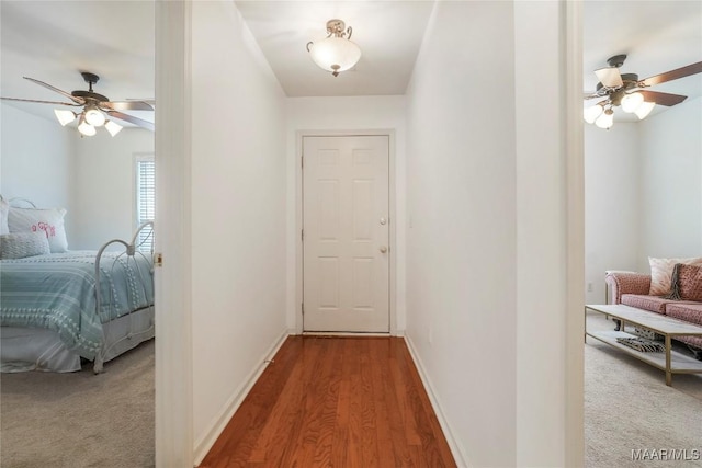 corridor with carpet floors