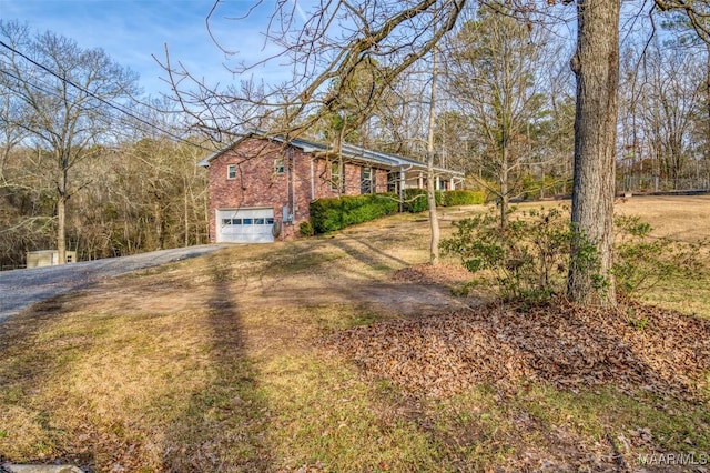 view of yard featuring a garage