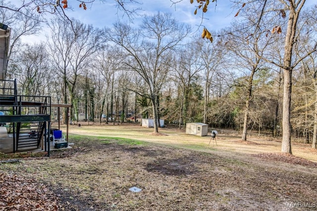 view of yard with a shed