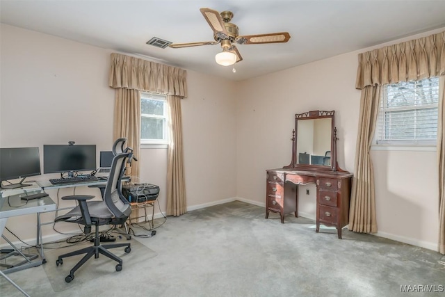 office with ceiling fan and carpet floors