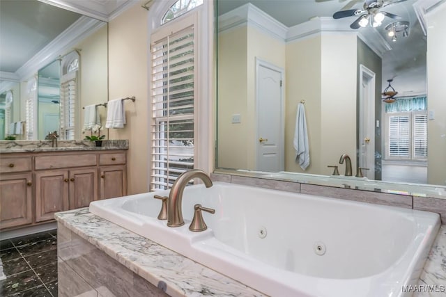 bathroom with ornamental molding, tiled bath, vanity, and ceiling fan