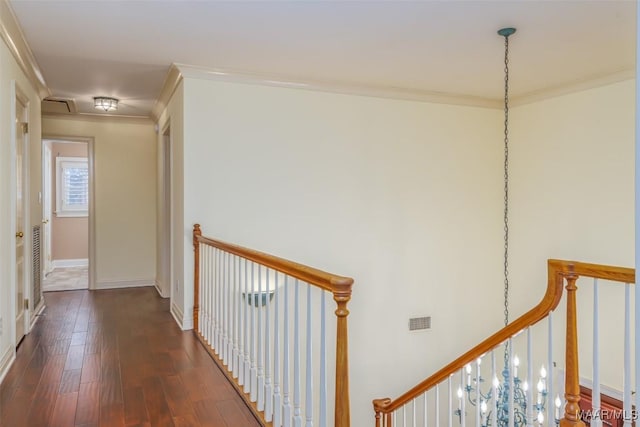 hall featuring crown molding and dark hardwood / wood-style floors