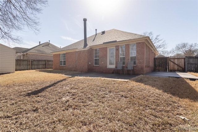 back of house featuring a patio