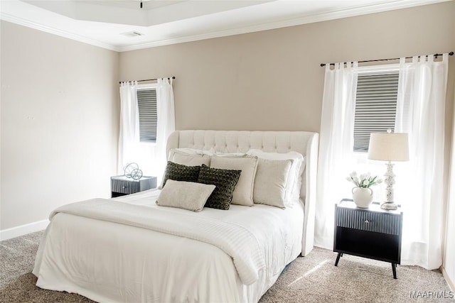 bedroom featuring carpet floors, visible vents, crown molding, and baseboards