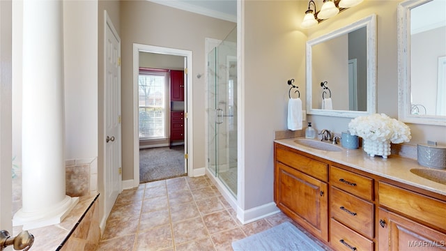 bathroom featuring crown molding, tile patterned floors, vanity, and independent shower and bath