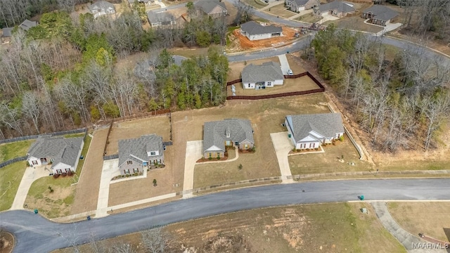 birds eye view of property with a residential view