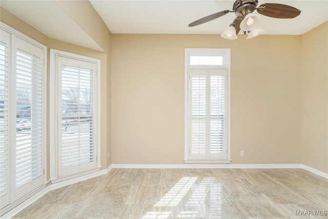 spare room featuring ceiling fan