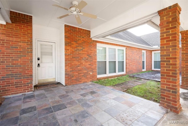 view of patio / terrace featuring ceiling fan