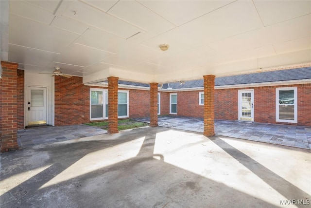 view of patio featuring ceiling fan