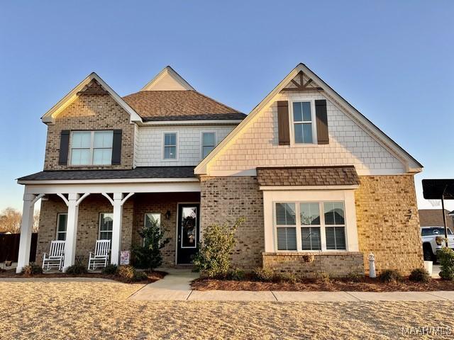 craftsman-style home with covered porch