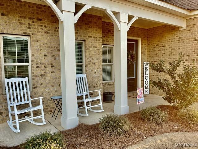 view of patio featuring a porch