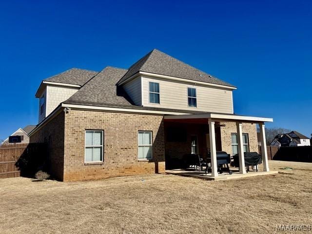 rear view of house featuring a patio