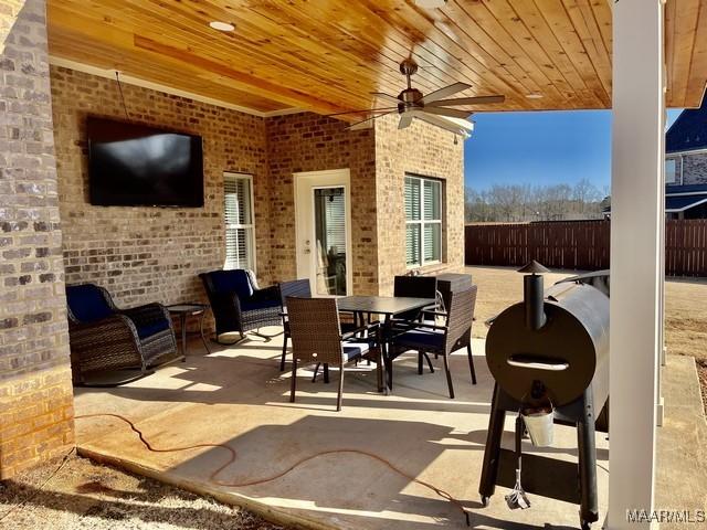 view of patio / terrace featuring ceiling fan