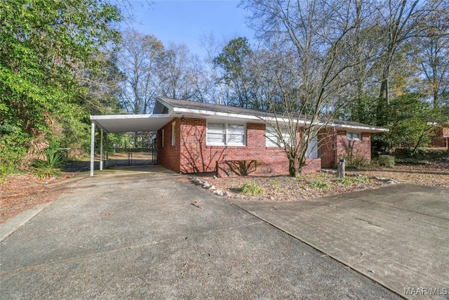 view of front of property with a carport