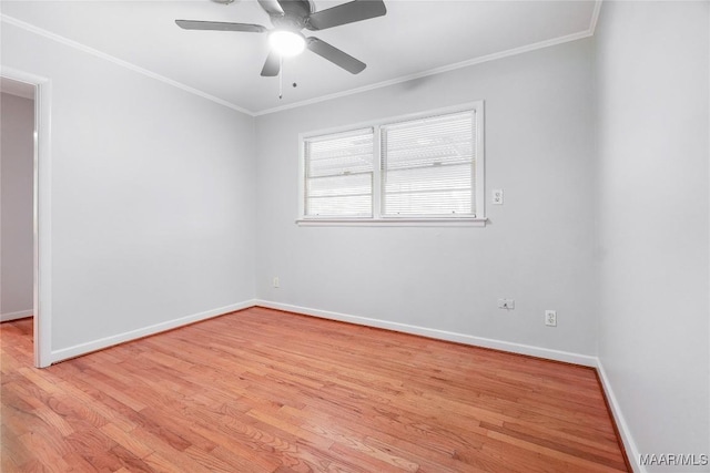 spare room with crown molding, ceiling fan, and light hardwood / wood-style floors