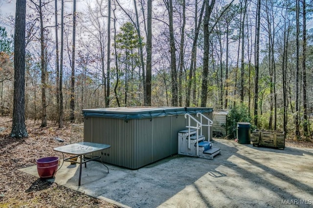 view of patio / terrace featuring a hot tub