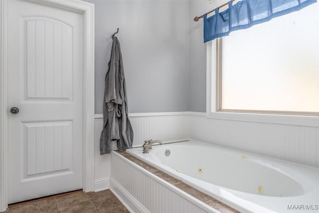 bathroom with a washtub