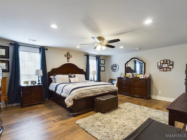 bedroom featuring dark wood-type flooring and ceiling fan