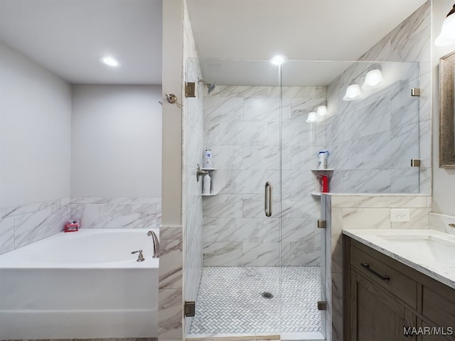 bathroom with vanity and plus walk in shower