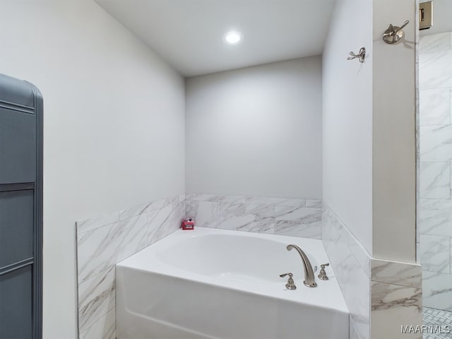 bathroom with a bathing tub