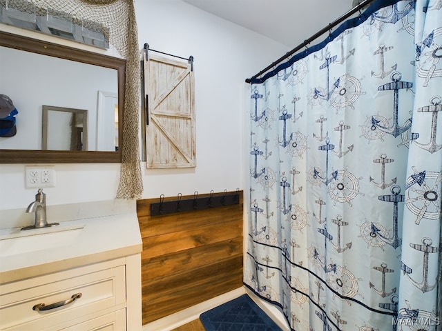 bathroom with vanity and a shower with shower curtain