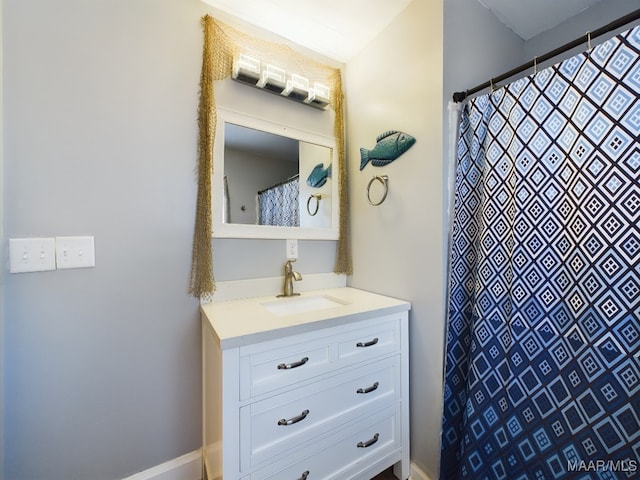 bathroom with vanity and walk in shower