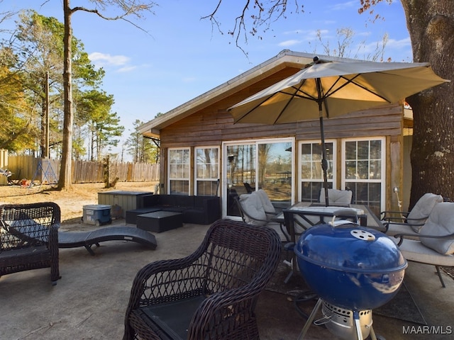 view of patio / terrace with an outdoor living space and grilling area