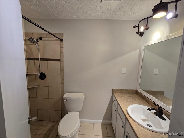 331 Bedford Ter, Prattville, AL 36066 - full bathroom featuring vanity, toilet, baseboards, a textured ceiling, and tile patterned floors
