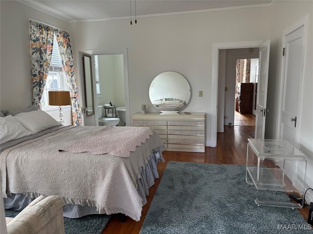 bedroom with ornamental molding and dark wood-type flooring