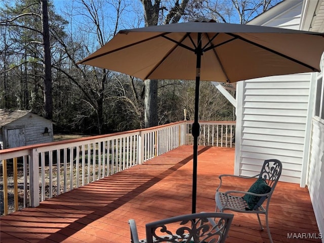 deck featuring a storage unit