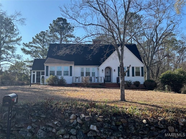 view of new england style home