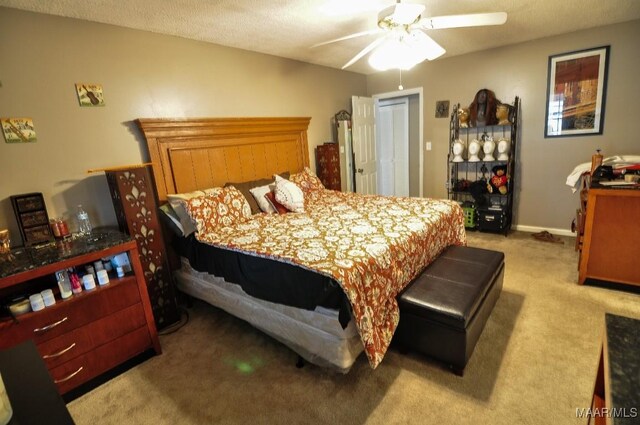 bedroom with light colored carpet and ceiling fan