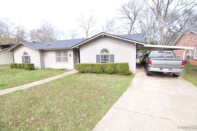 ranch-style house with a carport and a front yard