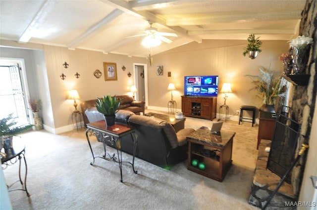 carpeted living room featuring lofted ceiling with beams and ceiling fan