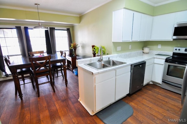 kitchen with sink, kitchen peninsula, pendant lighting, stainless steel appliances, and white cabinets